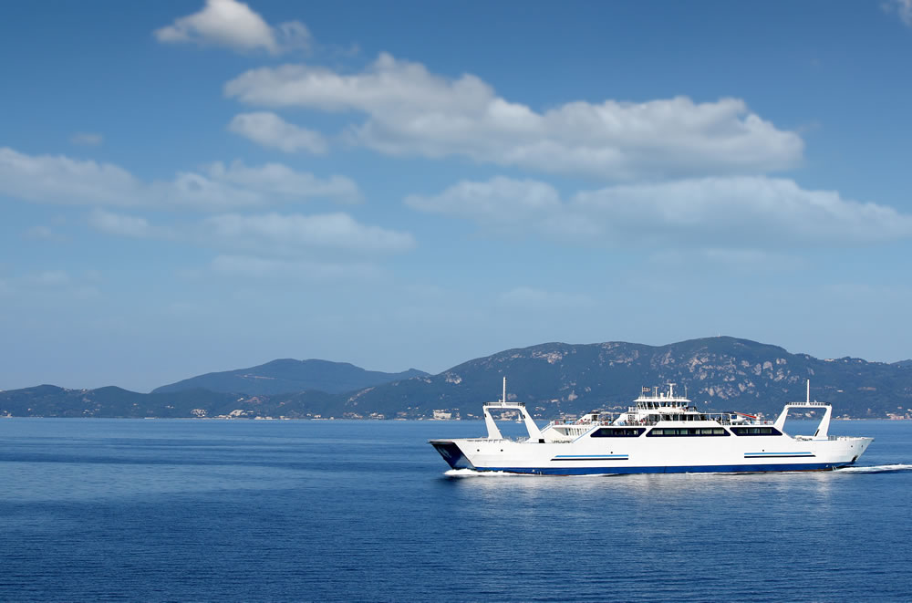 Passenger ferry arriving in Corfu by sea